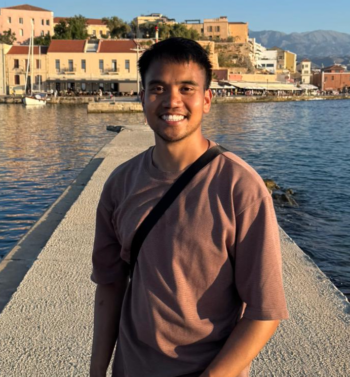 Ckyever standing on a pier